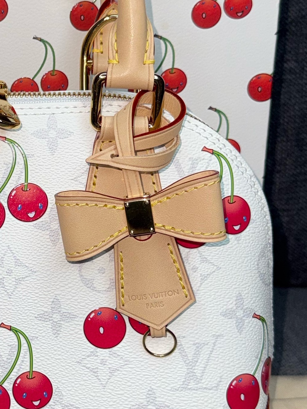 Louis Vuitton Murakami bow vachetta bag charm